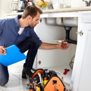 home seller checking plumbing