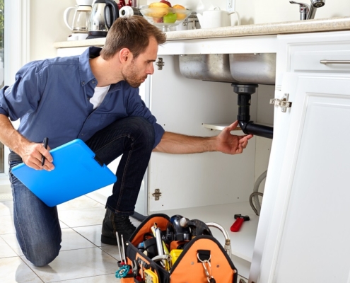 home seller checking plumbing